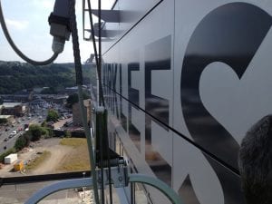 Swinging 200 feet in the air fitting some high level signage