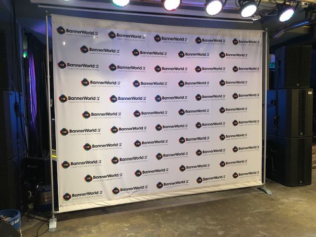 A step and repeat banner stand