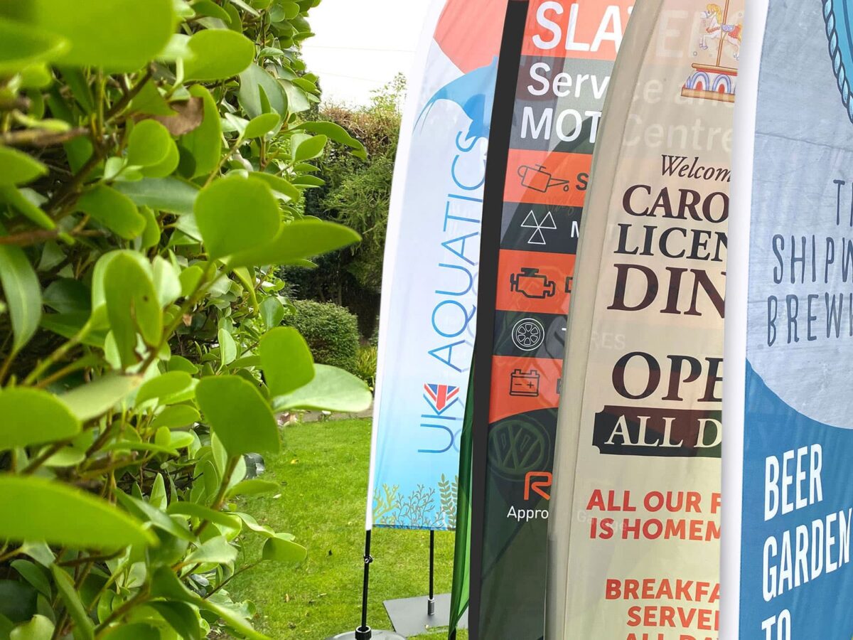 Feather Flags Vs. Other Outdoor Advertising Options: A Comparison ...