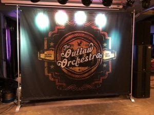 outlaw orchestra backdrop stand 1